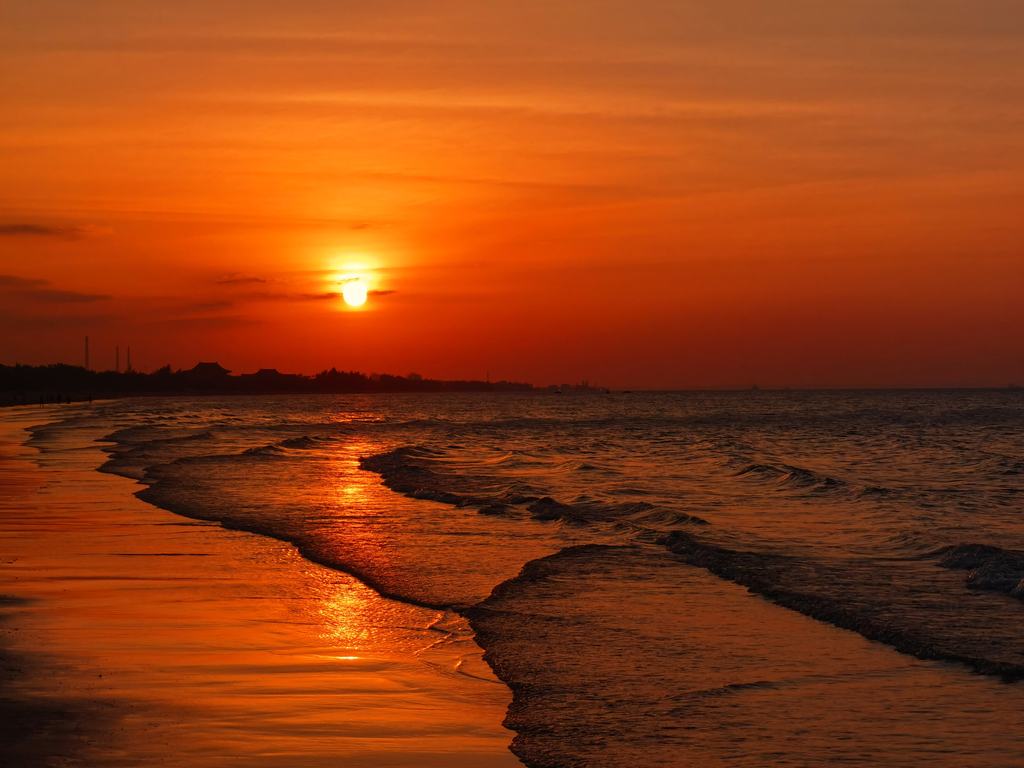 海边晚霞摄影照片